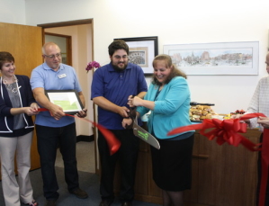 The ribbon cutting. Ossian Law open house celebration, 6/11/13