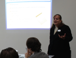 Photo of Kathy Ossian presenting on "Twibel and Other Online Defamation" on May 15, 2014.