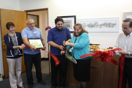 The ribbon cutting. Ossian Law open house celebration, 6/11/13